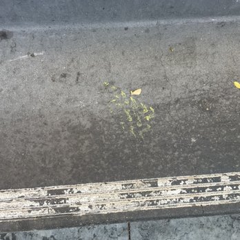 Santana Row - Shoe prints on the concrete from people walking through wet paint with no warning signs about it - Shopping Centers Near Me - San Jose, California