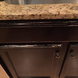 Kb Kitchen & Bath Concepts - Eroding finish on "Quality" Cabinets by Masco.