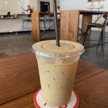 Hi Sign Brewing - Iced vanilla latte with oat milk - Breweries Near Me - Austin, Texas Hi Sign Brewing - Iced vanilla latte with oat milk - Breweries Near Me - Austin, Texas
