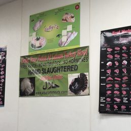 a variety of meat products displayed on a wall a variety of meat products displayed on a wall