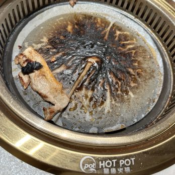 Qpot HotPot & BBQ - Burnt parchment paper onto the meat - Korean Near Me - Richmond, Virginia