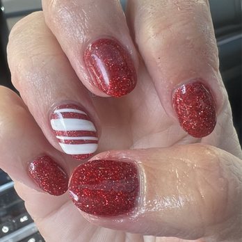 LUXE Salon - Red sparkly nails with candy, cane, accent nail - Hair Salons Near Me - Temple, Texas LUXE Salon - Red sparkly nails with candy, cane, accent nail - Hair Salons Near Me - Temple, Texas