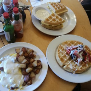 Monkey Business Cafe - Country omelette w/ berries-n-cream waffle upgrade and breakfast waffle sandwich in the back. - Sandwiches Near Me - Fullerton, California Monkey Business Cafe - Country omelette w/ berries-n-cream waffle upgrade and breakfast waffle sandwich in the back. - Sandwiches Near Me - Fullerton, California