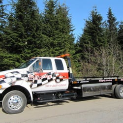 Integrity Towing & Recovery - flatbeds and recovery truck  available.