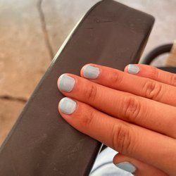 TJ Nails - Uneven coats of polish and obvious bad job.