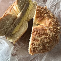 Asiago bagel sandwich with sausage egg and cheese