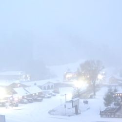 Caribel Condominiums - Snow falling in October in Red River!