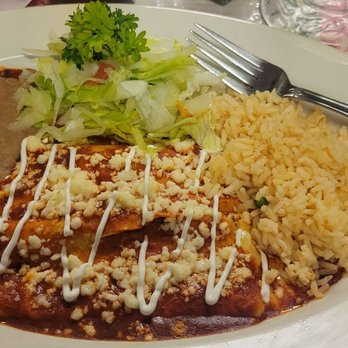 Rita's Cantina Mexican Kitchen - Cheese enchiladas with red sauce with queso Mexicano. - Mexican Near Me - Pinehurst, Texas