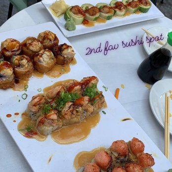 Shiro Restaurant - (Not sure what the cucumber roll is) Fatty roll, salmon on the beach and tornado. - Japanese Near Me - Novi, Michigan Shiro Restaurant - (Not sure what the cucumber roll is) Fatty roll, salmon on the beach and tornado. - Japanese Near Me - Novi, Michigan
