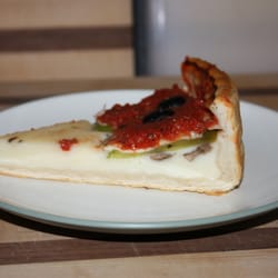 Edwardo's Natural Pizza Restaurant - The so-called "stuffed" pizza. Basically a block of mediocre-quality cheese. Did I mention that the "toppings" were $2.50 each?