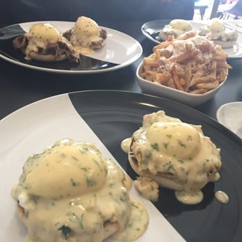 AnnaLena - Brunch spread of eggs bennys and the asiago fries - available on weekends! - Canadian (New) Near Me - Vancouver, British Columbia AnnaLena - Brunch spread of eggs bennys and the asiago fries - available on weekends! - Canadian (New) Near Me - Vancouver, British Columbia