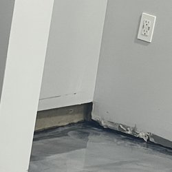 Potomac Garage Solutions - Bucked stain everywhere very oddly visible. 8-10"visible & ugly undercoat all around (this is their final product before protecting coat