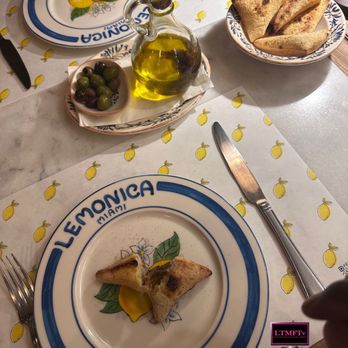 Lemonica - Started nice with complimentary oil, olives and triangles.. - Wine Bars Near Me - Hollywood, Florida