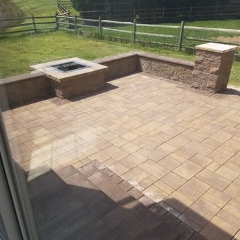 Green Planet Landscape - a patio with a fire pit - Landscaping Near Me Green Planet Landscape - a patio with a fire pit - Landscaping Near Me