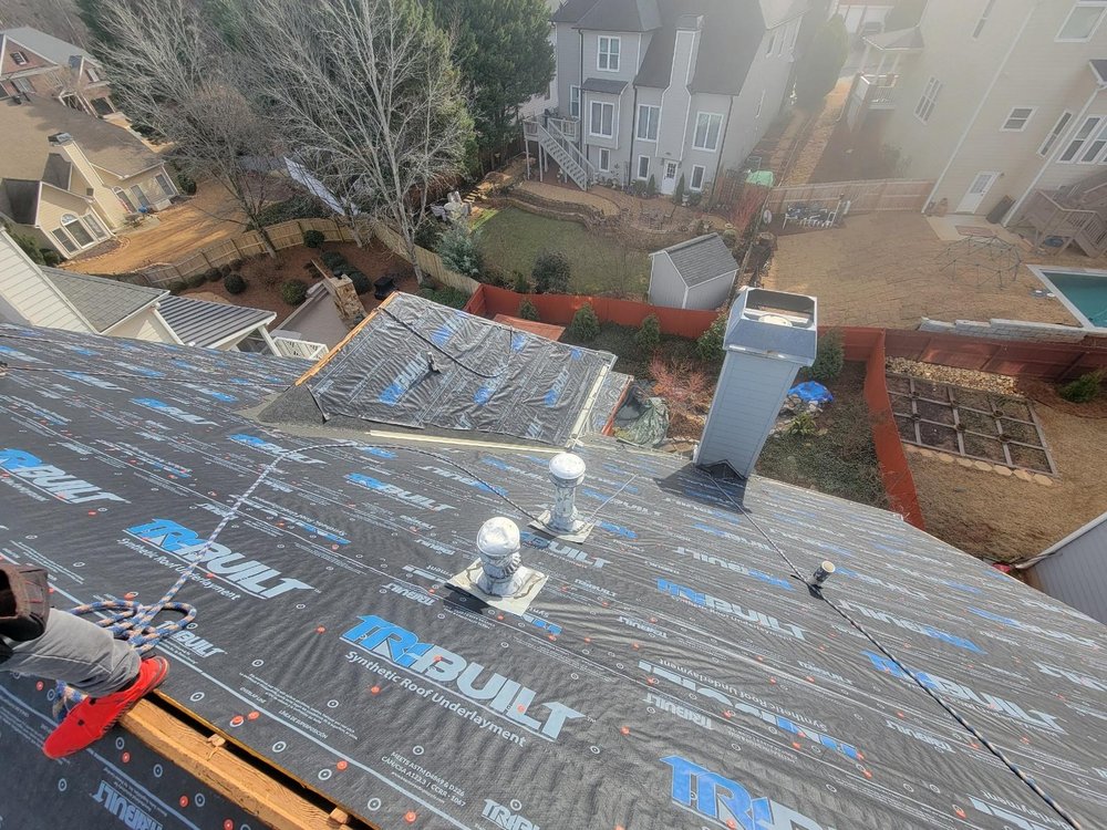 Slide of The Roofing Specialists