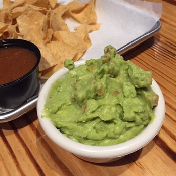 El Maguey Cafe - Large guacamole ($7) with barely any chips to eat it. Very bland until I stirred in some salt. - Mexican Near Me - Newport, Michigan