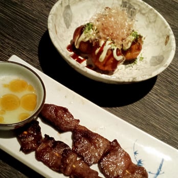 DOZO Izakaya - Beef tongue and some takoyaki with bonito flakes. - Sushi Bars Near Me - Tempe, Arizona DOZO Izakaya - Beef tongue and some takoyaki with bonito flakes. - Sushi Bars Near Me - Tempe, Arizona