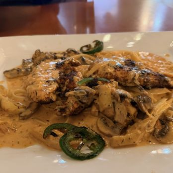 The Brick House - Blackened chicken with artichokes, jalapeños, with brandy cream sauce over fettuccine noodles - Seafood Near Me - Ada, Oklahoma The Brick House - Blackened chicken with artichokes, jalapeños, with brandy cream sauce over fettuccine noodles - Seafood Near Me - Ada, Oklahoma