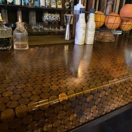 Cool Bartop! Pennies in the bar countertop.