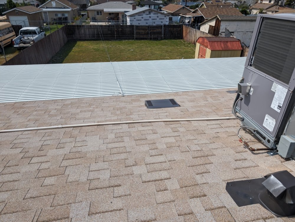 Slide of Luna Roofing