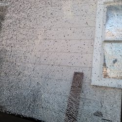 California Auto Glass - The only thing holding this window together is the tint film!