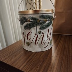 Topsy's Popcorn & Ice Cream Shoppes - This is my husband's cheese popcorn tin from Topsy's for 2022.
