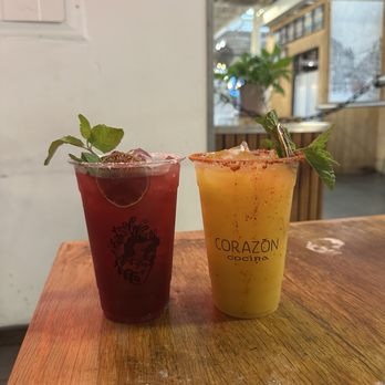 Corazon Cocina - Left: hibiscus margarita ($21). Right: passionfruit margarita ($24) - Mexican Near Me - Santa Barbara, California