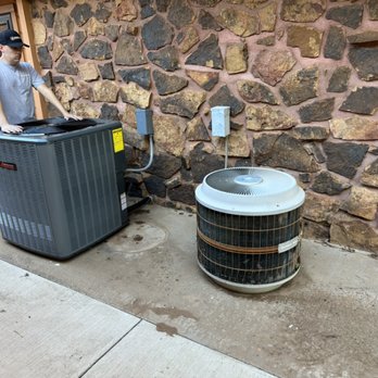 Essential Heating And Air - Wow look at that difference! New system installed, old unit and new unit are actually the same tonnage! - Heating & Air Conditioning/HVAC Near Me - Enid, Oklahoma