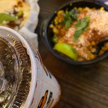 Torchy's Tacos - a close up of a drink and a plate of food - Tex-Mex Near Me - Richmond, Texas