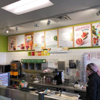 Jamba - a woman standing at a counter in a fast food restaurant - Juice Bars & Smoothies Near Me - Maple Grove, Minnesota Jamba - a woman standing at a counter in a fast food restaurant - Juice Bars & Smoothies Near Me - Maple Grove, Minnesota