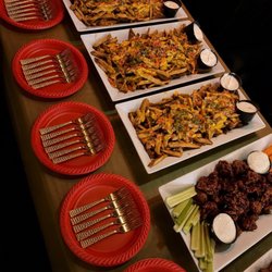 The Rabbit Hole Astoria - Catering and private party buffet: loaded fries and wings at The Rabbit Hole Astoria