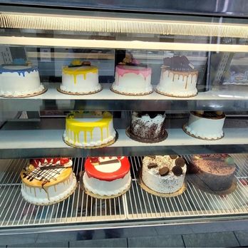 MC Bakery and Coffeeshop II - a display of cakes - Coffee & Tea Near Me - The Bronx, New York MC Bakery and Coffeeshop II - a display of cakes - Coffee & Tea Near Me - The Bronx, New York