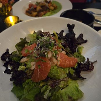 Magpie Cafe - The shrimp, grapefruit and avocado salad with the gnocchi dish in the background. - New American Near Me - Sacramento, California Magpie Cafe - The shrimp, grapefruit and avocado salad with the gnocchi dish in the background. - New American Near Me - Sacramento, California
