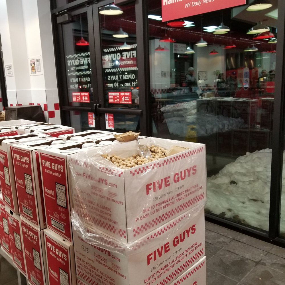 Five Guys - boxes of five guys burgers in front of a five guys store - Burgers Near Me - Greeley, Colorado Five Guys - boxes of five guys burgers in front of a five guys store - Burgers Near Me - Greeley, Colorado