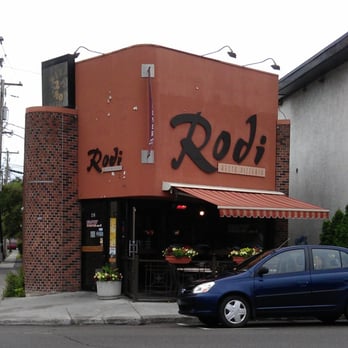 Pizza Rodi - a blue car parked in front of a restaurant - Pizza Near Me - Chicoutimi, Quebec Pizza Rodi - a blue car parked in front of a restaurant - Pizza Near Me - Chicoutimi, Quebec