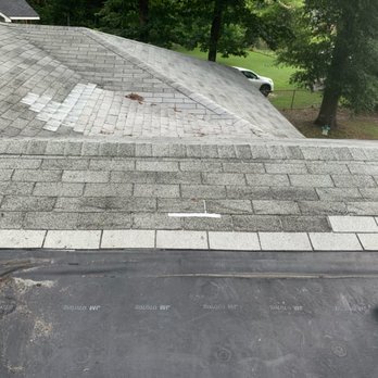 Ram Renovations - a man on a skateboard on the roof of a house - Roofing Near Me Ram Renovations - a man on a skateboard on the roof of a house - Roofing Near Me