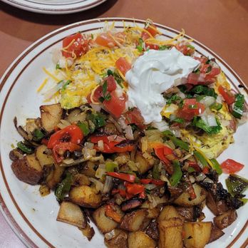 Serrano's Cafe - Serrano's Mamba Omelette Louisiana sausage, mushroom, spinach, Pico de gallo, sour cream and cheese. Home fries and English muffin - Breakfast & Brunch Near Me - West Sacramento, California Serrano's Cafe - Serrano's Mamba Omelette Louisiana sausage, mushroom, spinach, Pico de gallo, sour cream and cheese. Home fries and English muffin - Breakfast & Brunch Near Me - West Sacramento, California