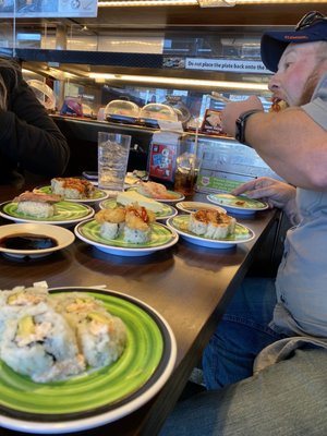 Kura Revolving Sushi Bar by null