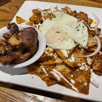 Atkins Park Tavern - Chilaquiles with Smashed Potatoes - American Near Me - Smyrna, Georgia Atkins Park Tavern - Chilaquiles with Smashed Potatoes - American Near Me - Smyrna, Georgia