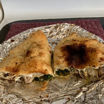 Gianni's Pizza - Froman Pesto Calzone with mushrooms, spinach, mozzarella cheese, sausage and sweet onions. - Pizza Near Me - Oceanside, California Gianni's Pizza - Froman Pesto Calzone with mushrooms, spinach, mozzarella cheese, sausage and sweet onions. - Pizza Near Me - Oceanside, California