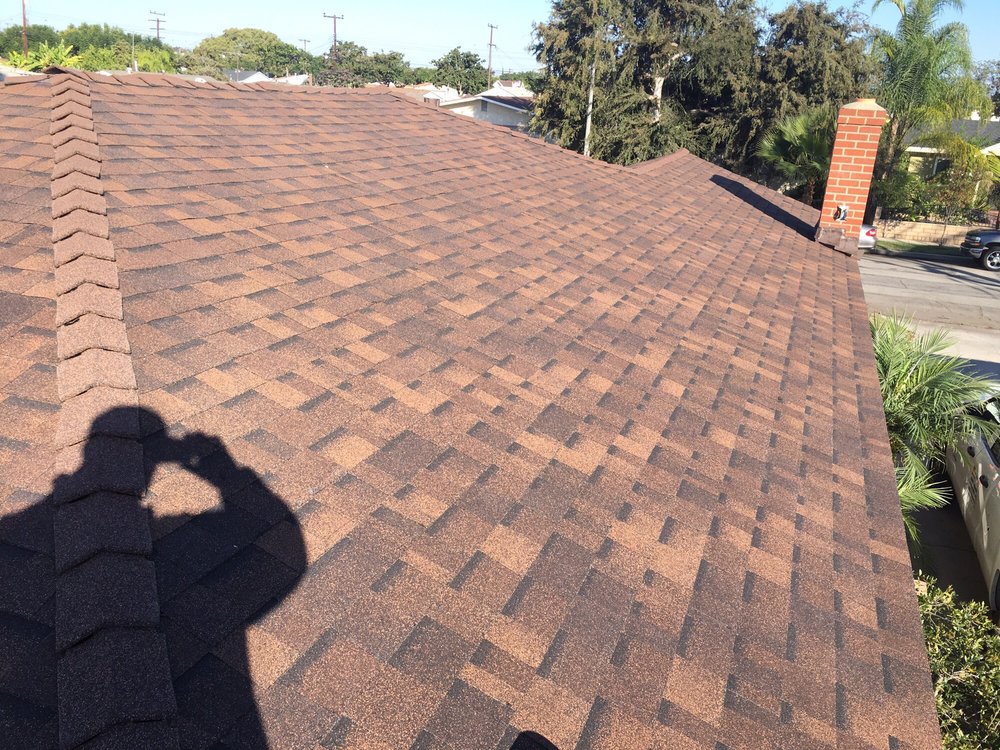 Slide of Trinity Roofing L & R Brothers