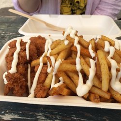 Mother Clucker Van - We went here on a weekend just as it opened. Wow did it taste fresh. The chicken was moist. The seasoning was strong. The chips were great.