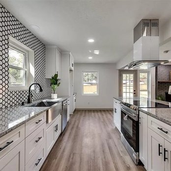 Lode - a kitchen with white cabinets and a wood floor - Kitchen & Bath Near Me - Dallas, Texas Lode - a kitchen with white cabinets and a wood floor - Kitchen & Bath Near Me - Dallas, Texas