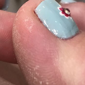 Bridgeport Nails - $30 for prior paint still showing, a 'why bother' flower and had to by a foot scrubber for what scrub? - Skin Care Near Me - Tigard, Oregon