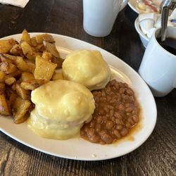 The White Apron - Egg Benedict with tomato, potato and beans.