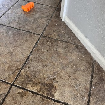 Western States Flooring - a dirty tile floor - Flooring Near Me - Chandler, Arizona