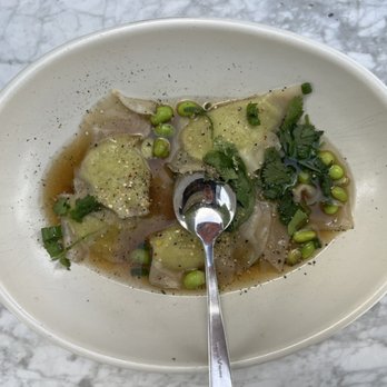 True Food Kitchen - edamame dumplings: white truffle oil, dashi, Thai basil = $14.95 - Vegetarian Near Me - Pasadena, California True Food Kitchen - edamame dumplings: white truffle oil, dashi, Thai basil = $14.95 - Vegetarian Near Me - Pasadena, California