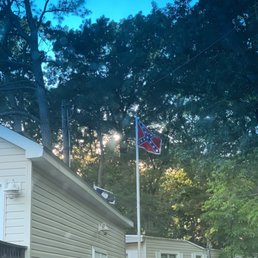 Racist flag flying steps away from campground office. Racist flag flying steps away from campground office.