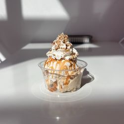 Salted Carmel cookie dough and vanilla ice cream, pecans, Carmel sauce and whip