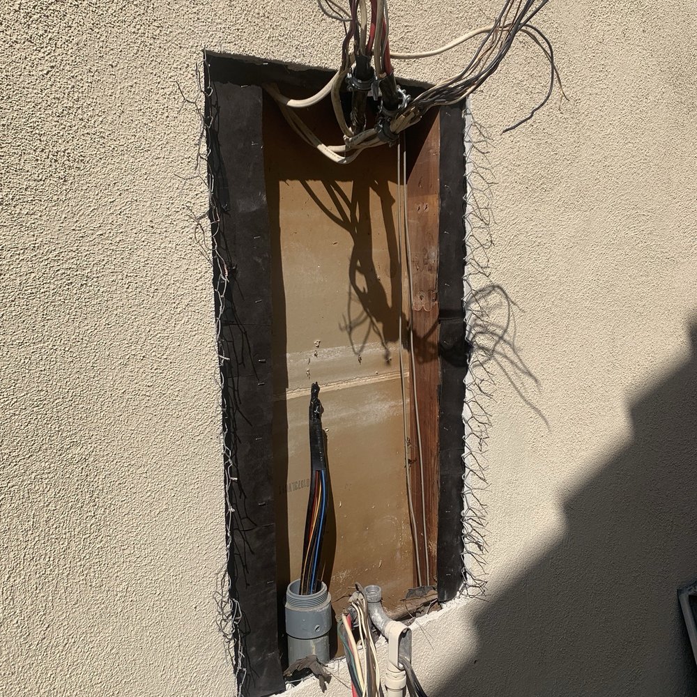 Fullerton Electric - 125A panel removed, before new 200A panel was installed. - Electricians Near Me - Fullerton, California